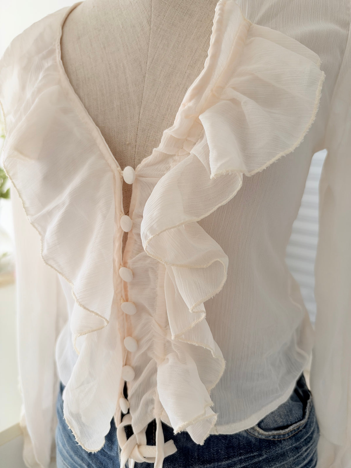 Cream ruffle top