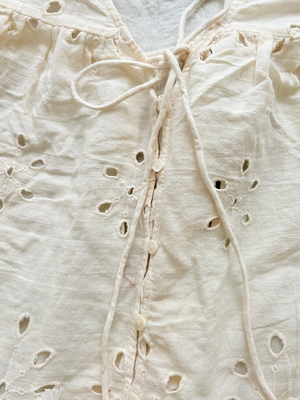 Cream eyelet top
