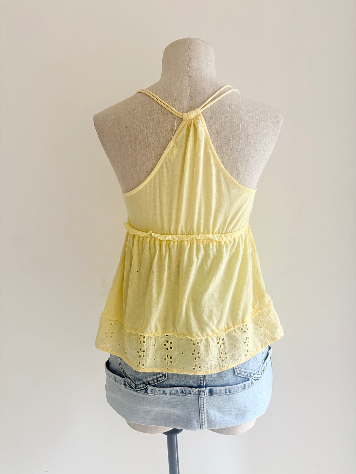 Yellow eyelet top