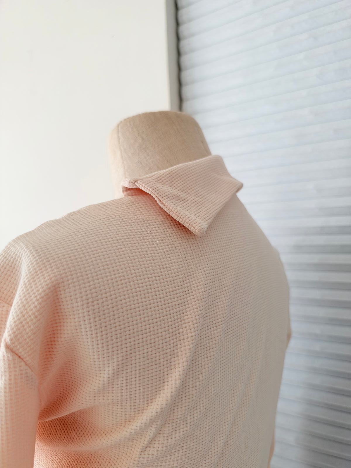 Cream side buttoned top