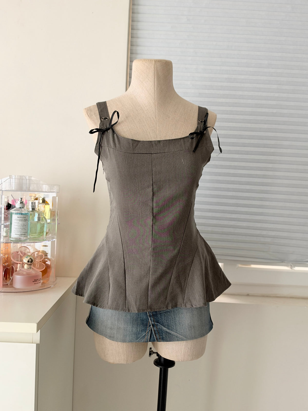 Grey peolum top