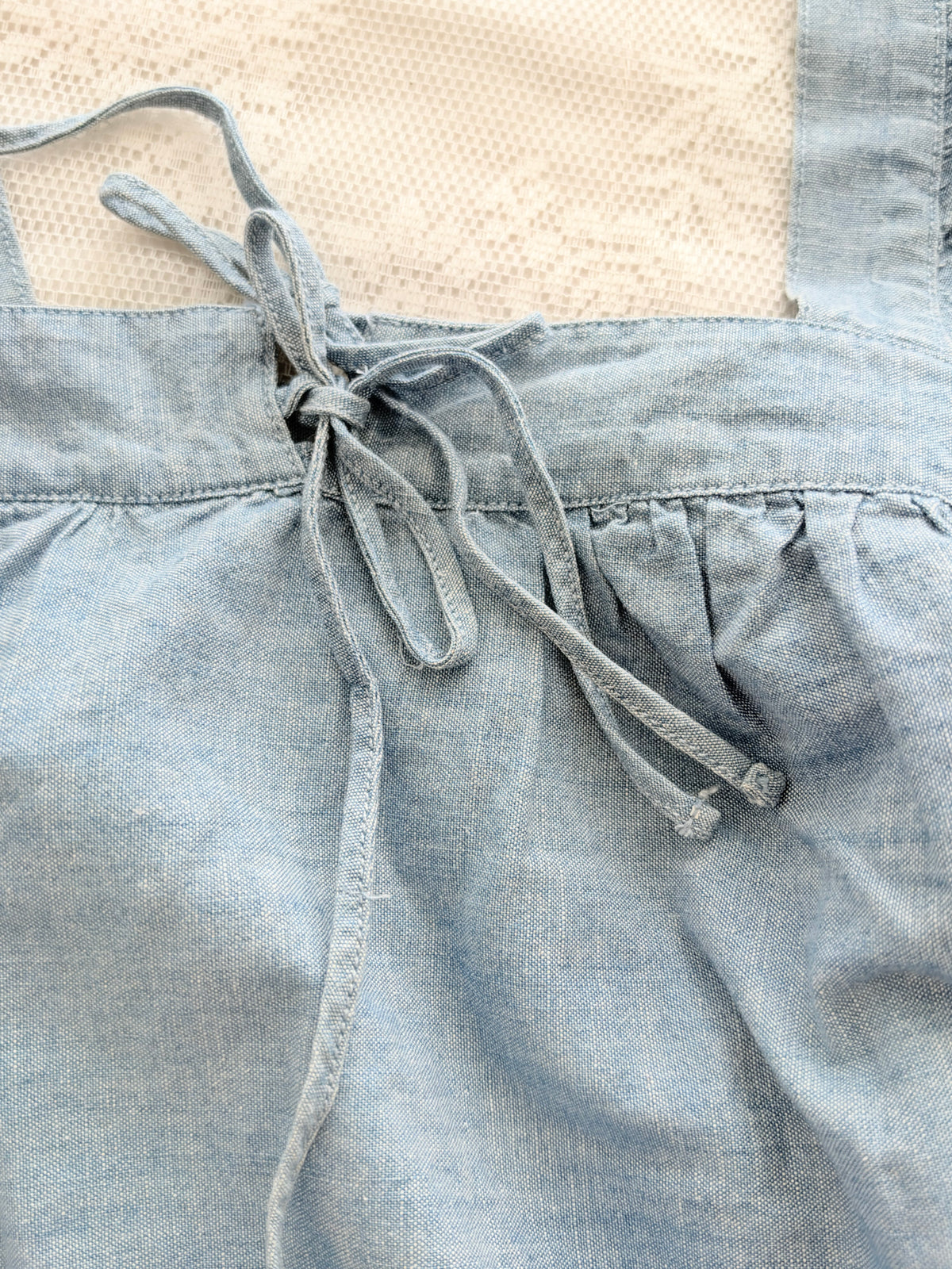 Blue eyelet top