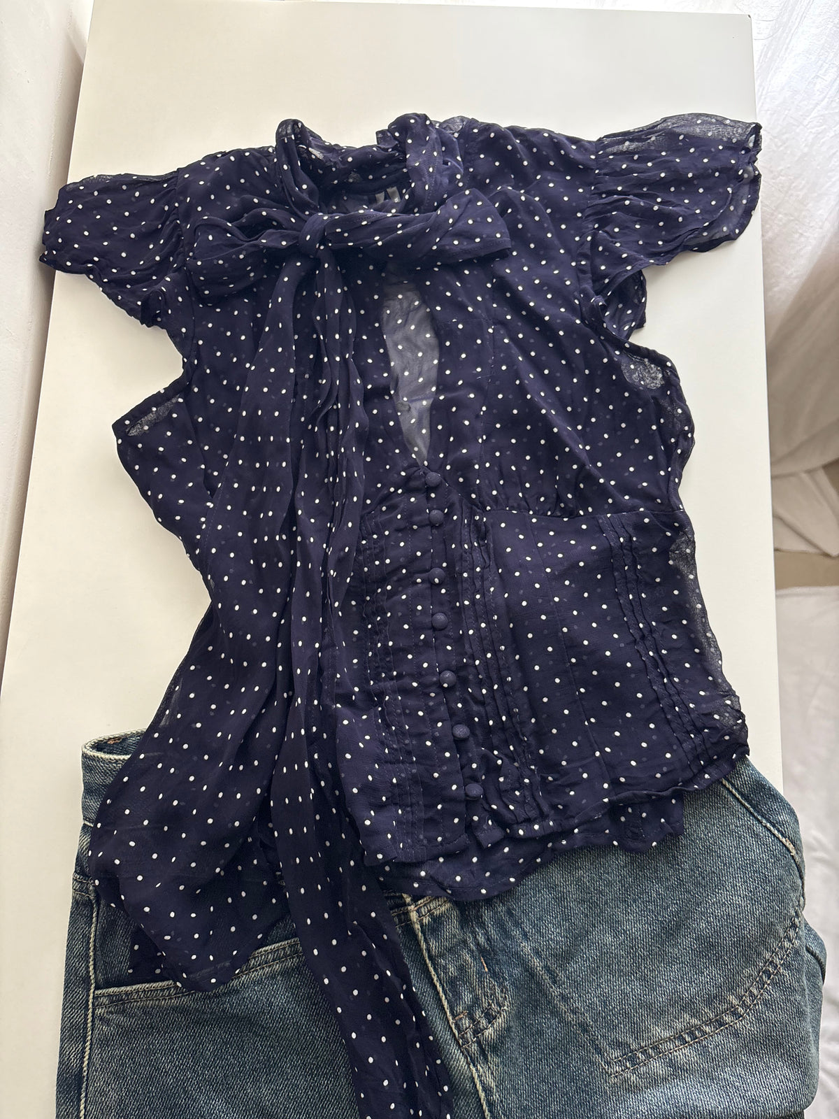 Navy polka tie top