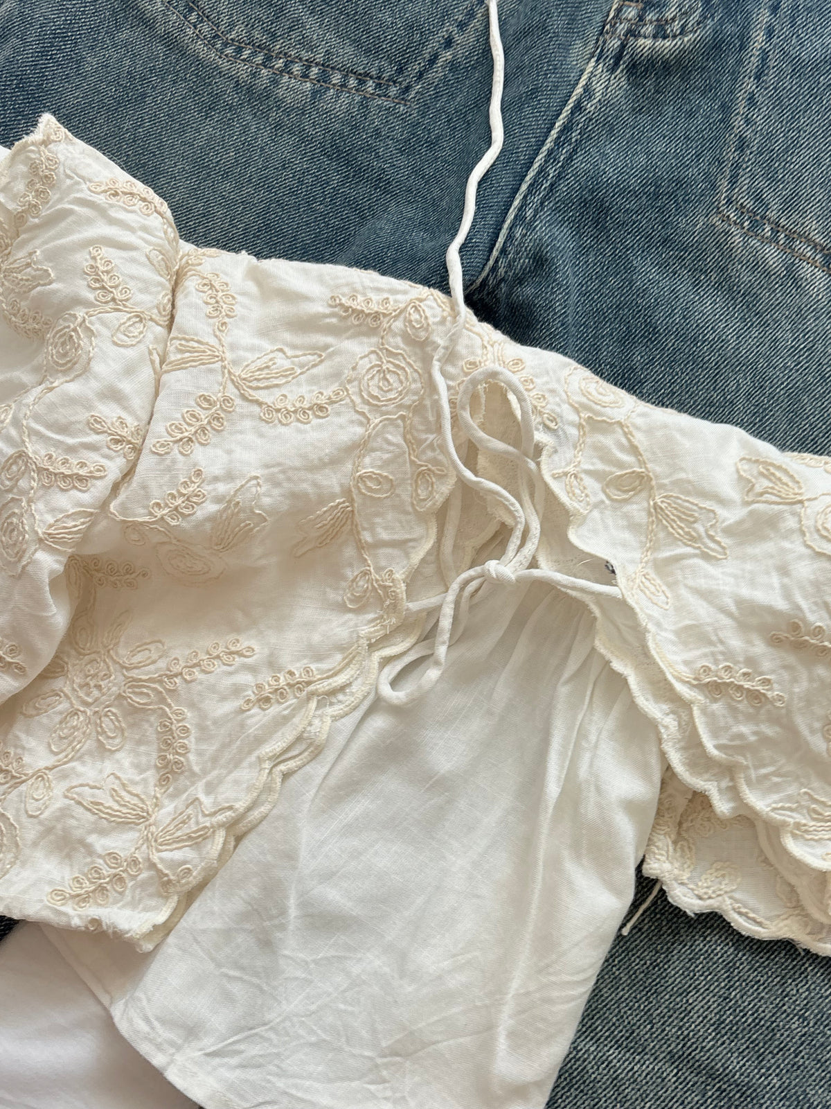 Embroidered cream top