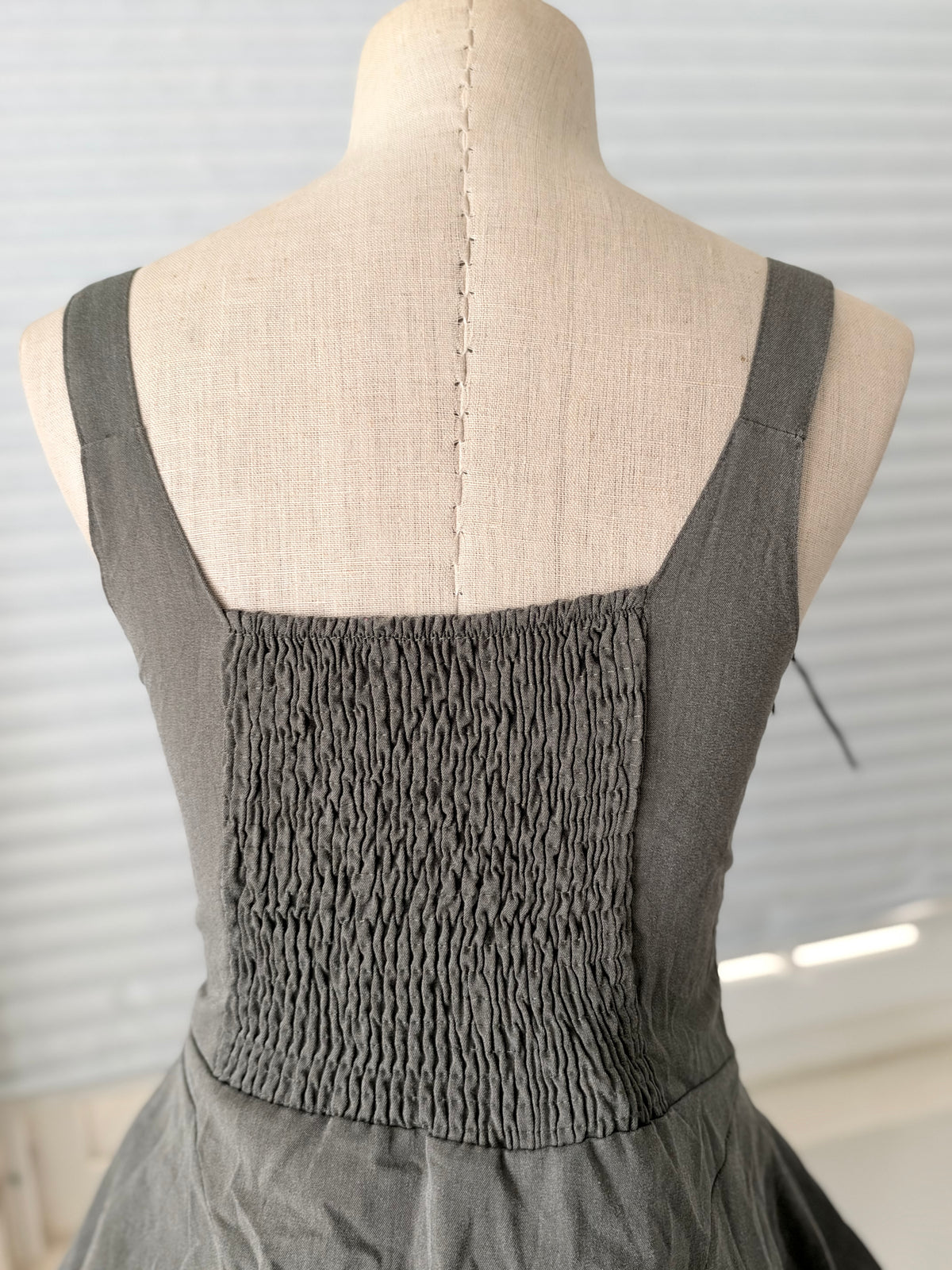 Grey peolum top