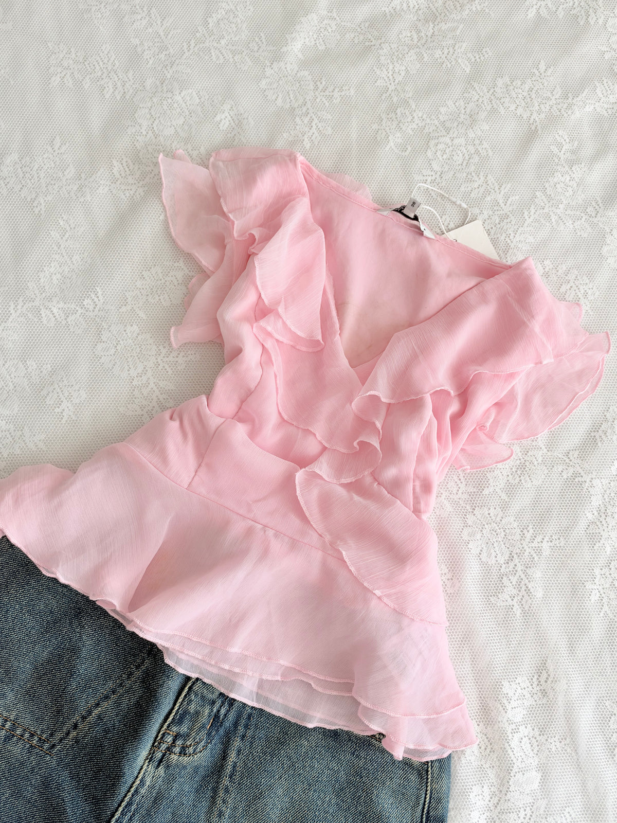 Pink ruffle top