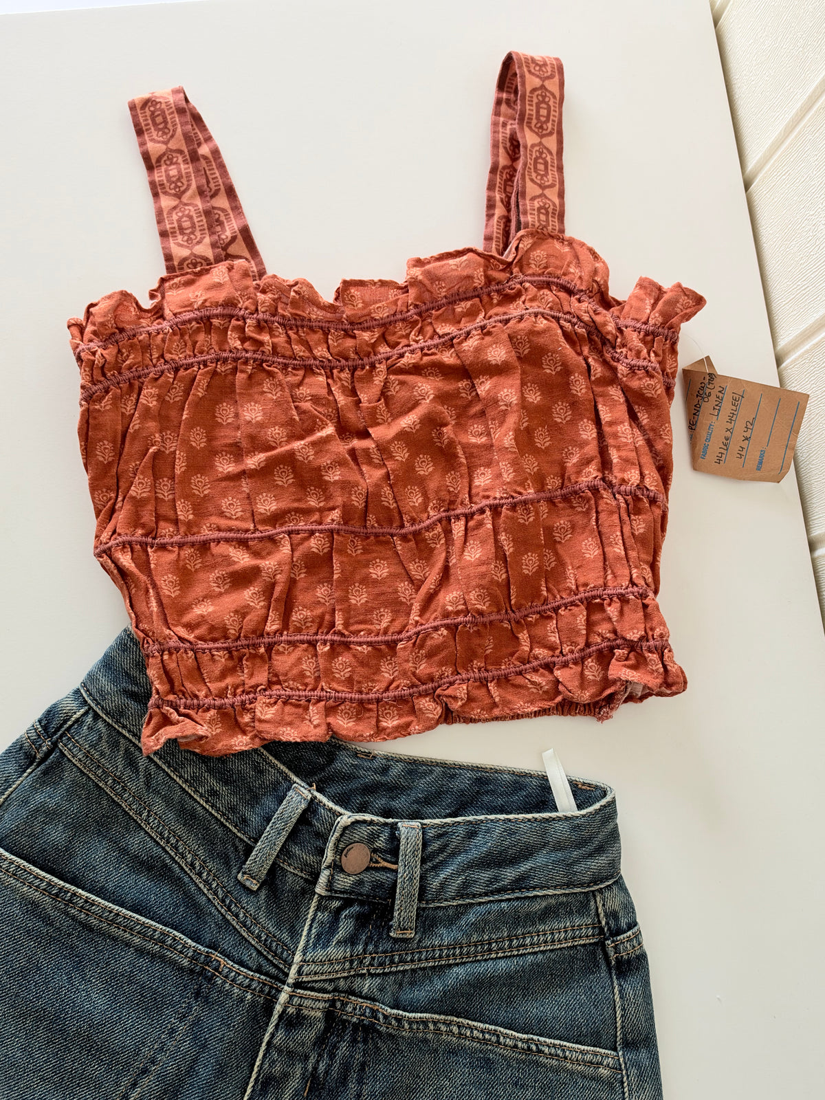 Orange smocked top