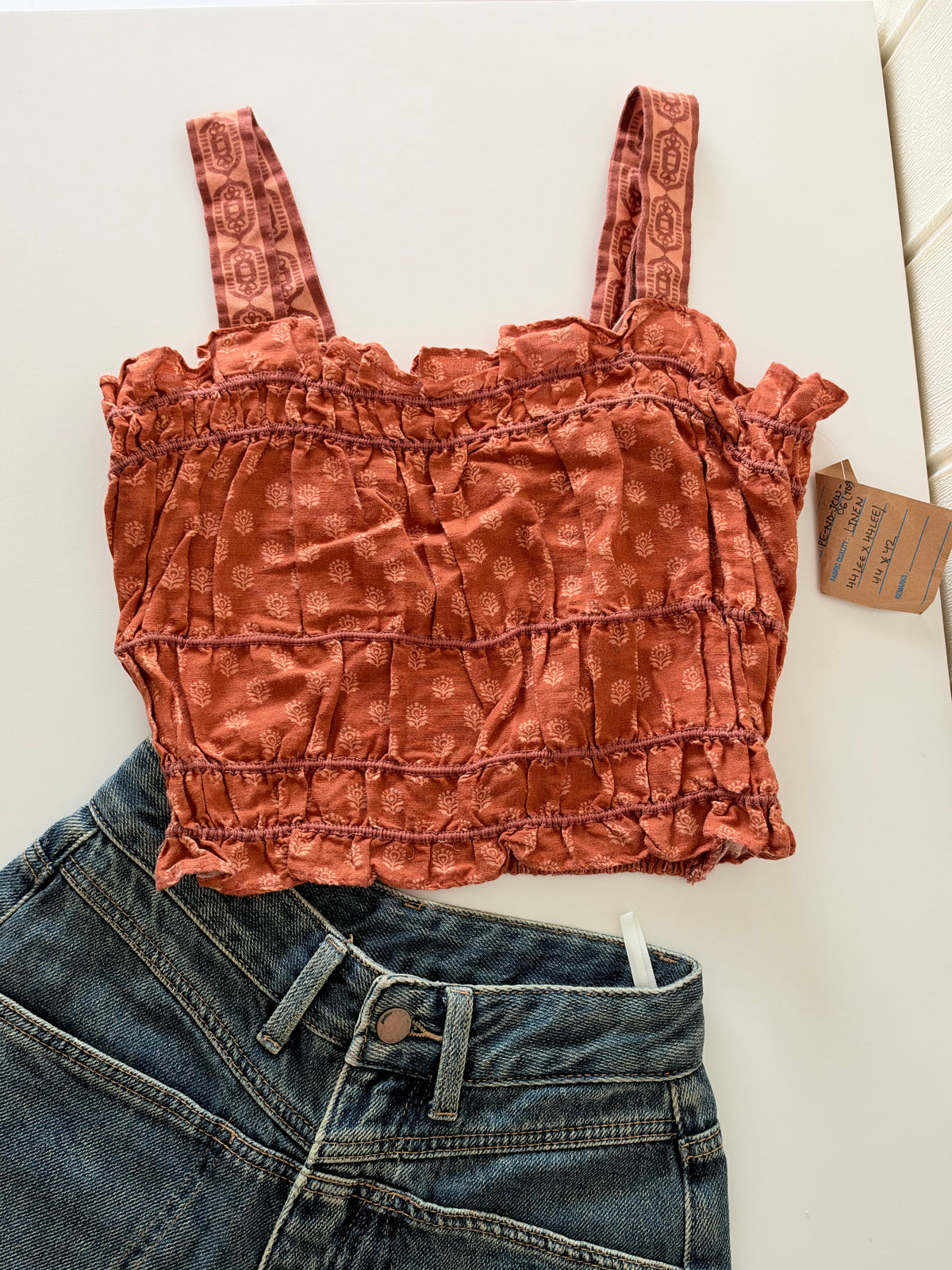 Orange smocked top