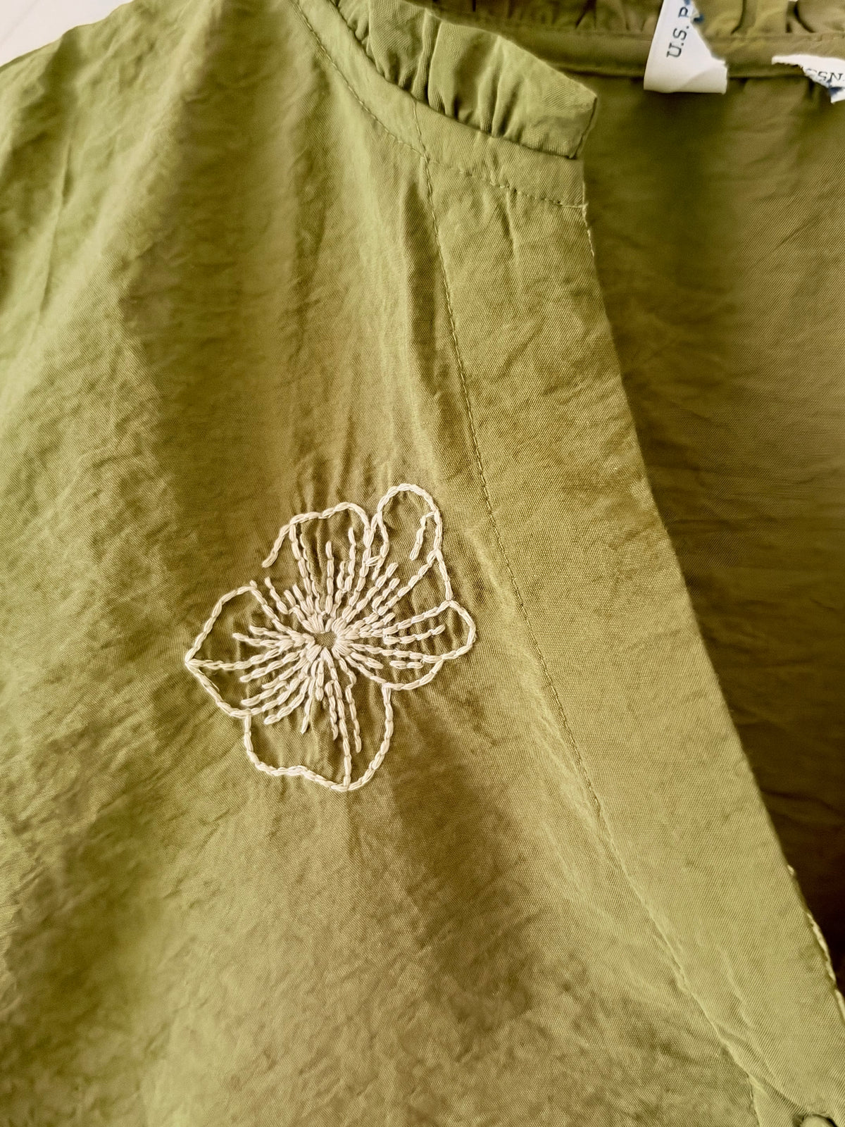 Green embroidered shirt