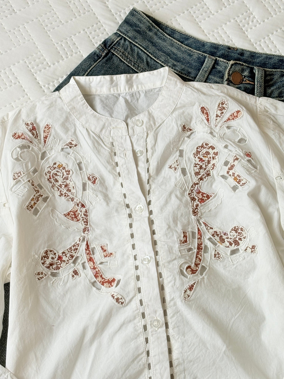 White detailing buttoned down