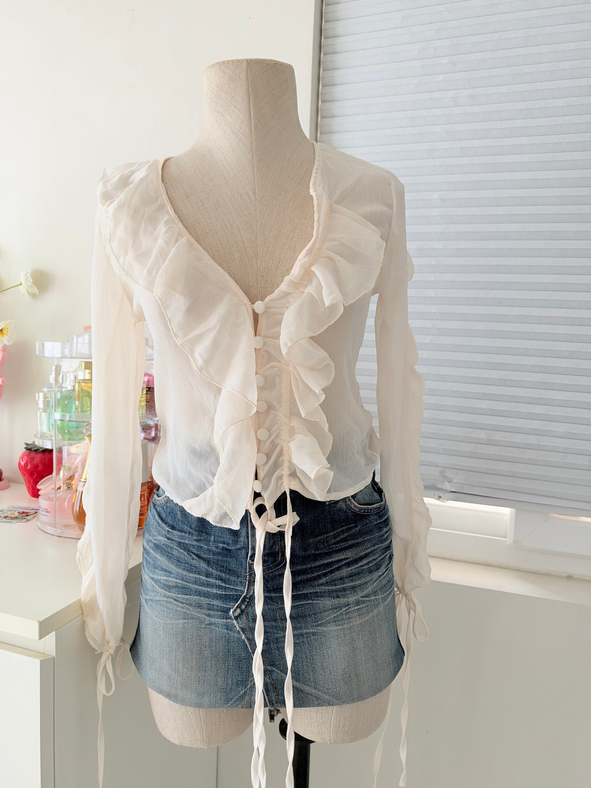 Cream ruffle top