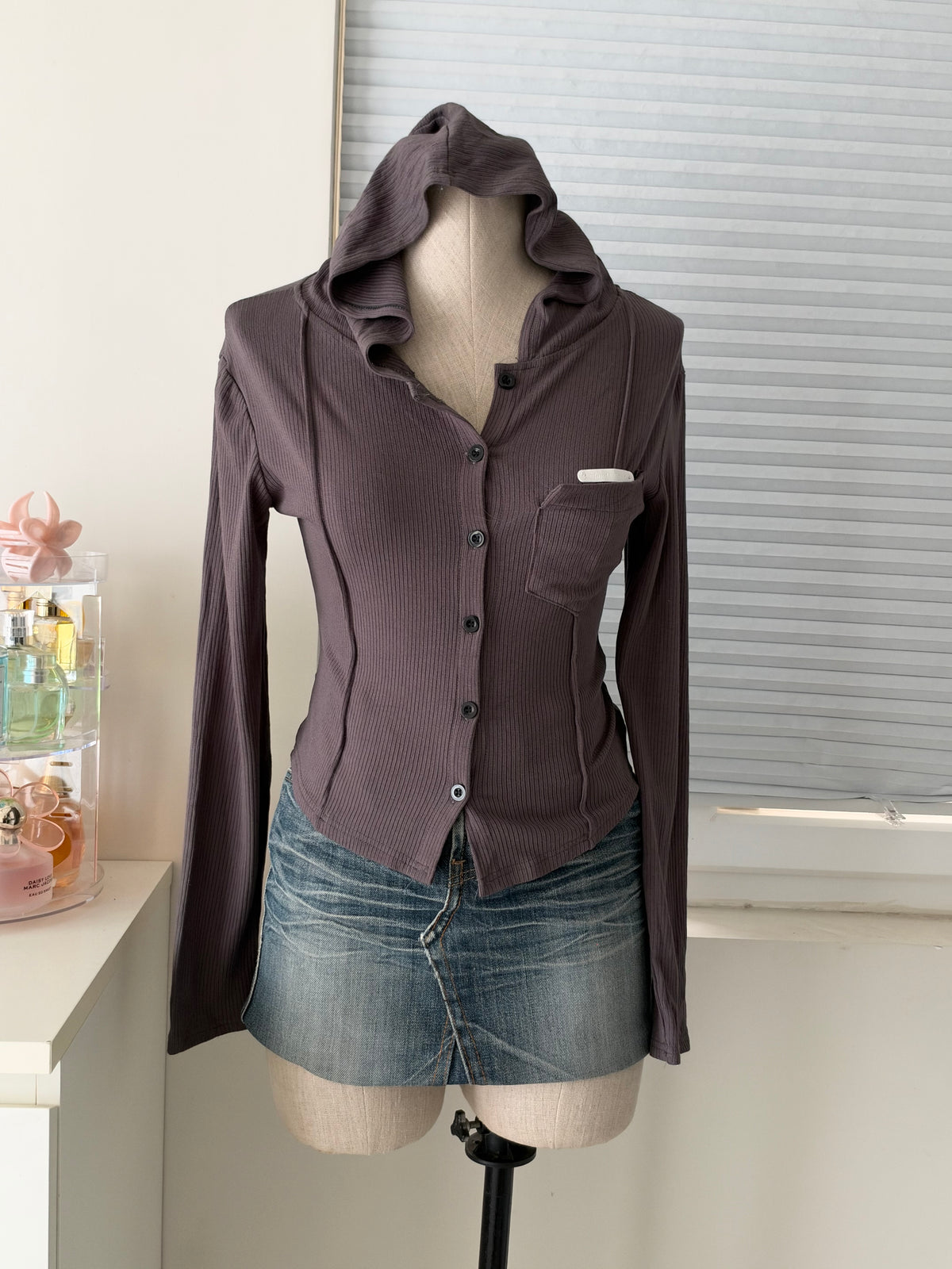 Grey hooded top
