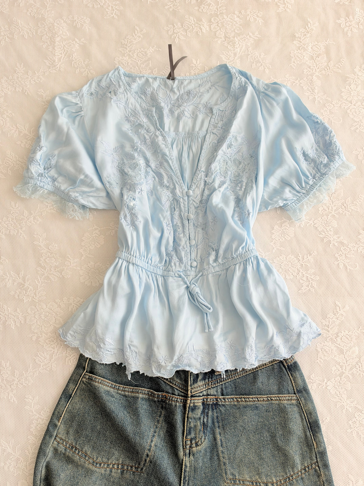 Blue embroidered satin top