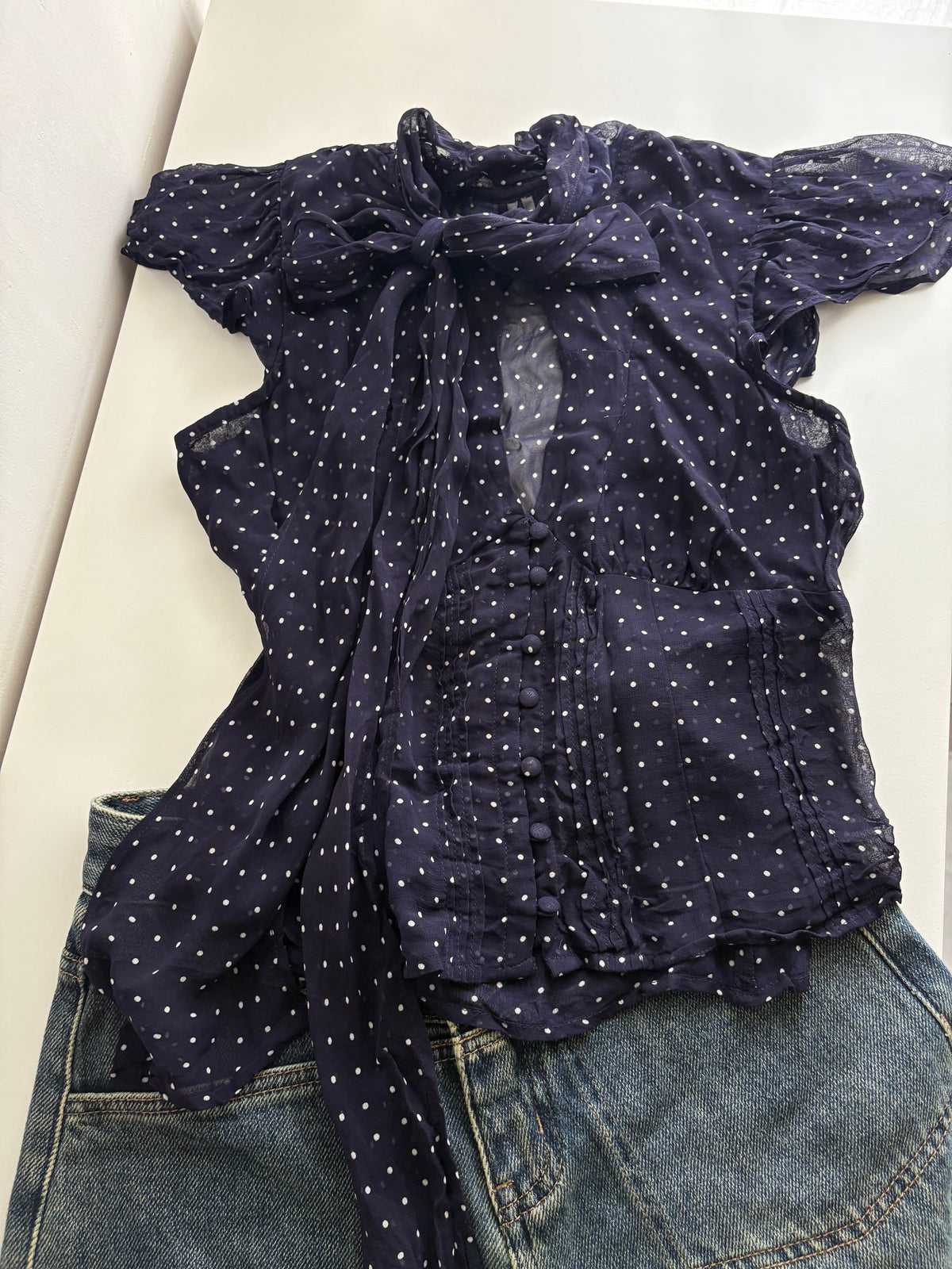 Navy polka tie top